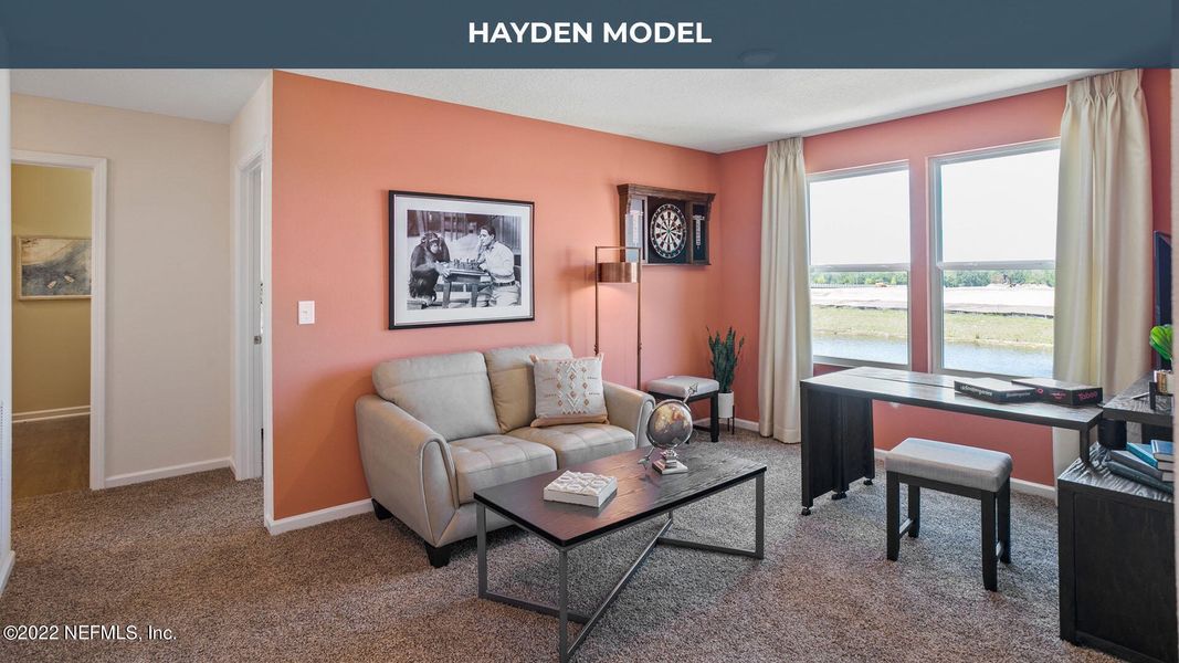 Furnished interior view inside a new home in Cross Creek Express, Green Cove Springs (Image 17).