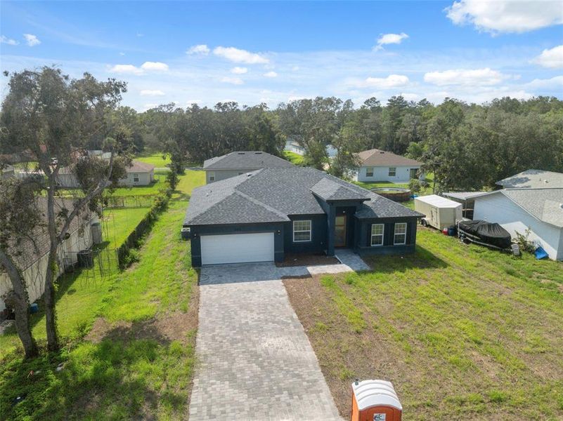 Front exterior of a new home in , Ocala, FL, highlighting curb appeal (Image 19).