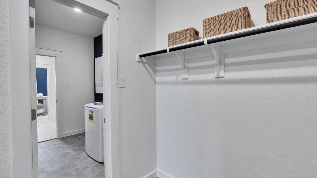 Representative furnished interior of a home built from the Meyerson by DRB Homes in Infinity Square, Kyle (Image 29).