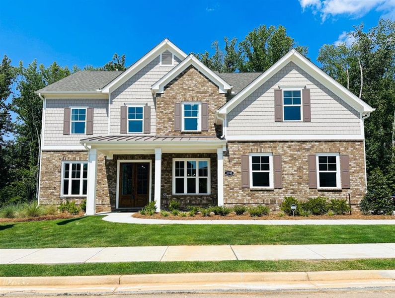 Front exterior of a new home in Hillshire, Cumming, GA, highlighting curb appeal (Image 21).