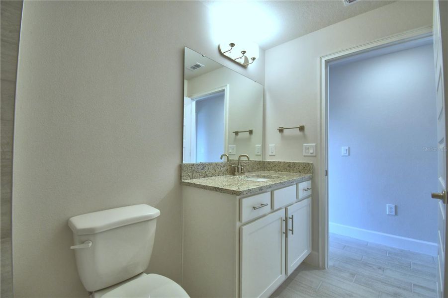 Furnished interior view inside a new home in Lake Juliana Estates, Auburndale (Image 12).