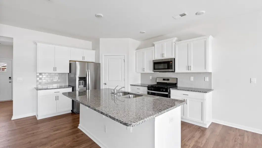 Furnished interior view inside a new home in Durbin Meadows Traditions, Fountain Inn (Image 9).