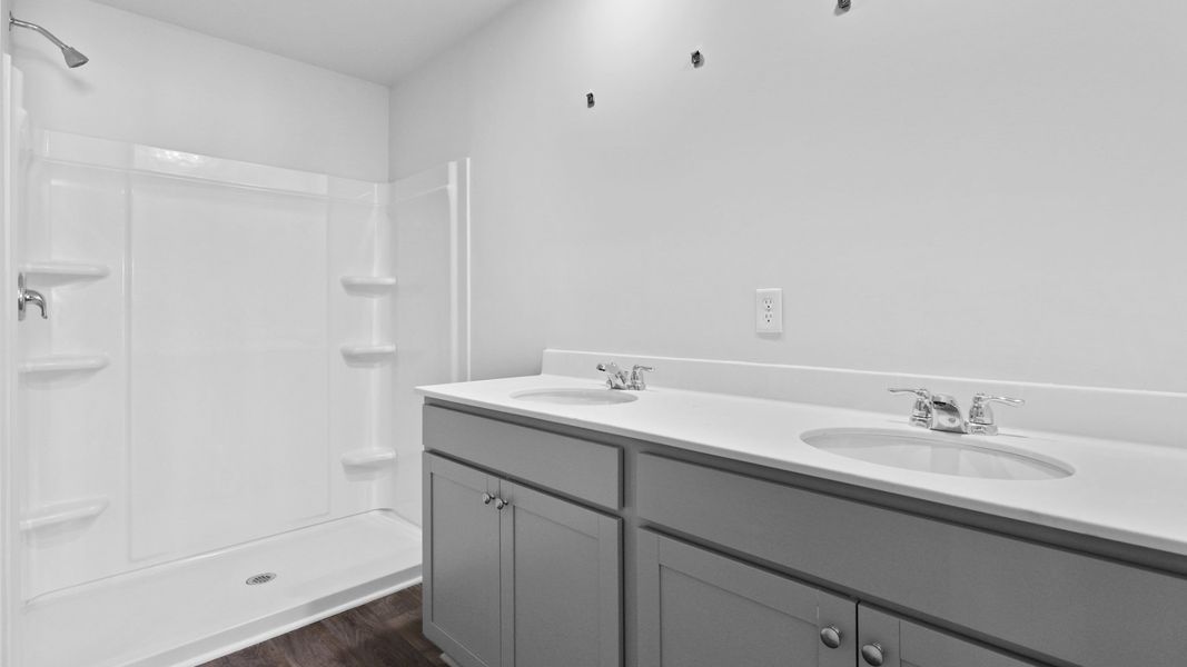 Representative furnished interior of a home built from the Cali by D.R. Horton in Center Pointe, Santee (Image 9).