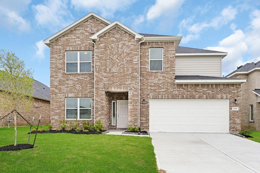 Front exterior of a new home in Lago Mar, Texas City, TX, highlighting curb appeal (Image 1). Front exterior of a new home in Lago Mar, Texas City, TX, highlighting curb appeal (Image 1).