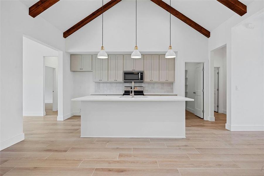 Kitchen with walk in pantry.