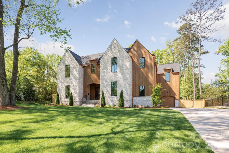 Front exterior of a new home in , Charlotte, NC, highlighting curb appeal (Image 26).