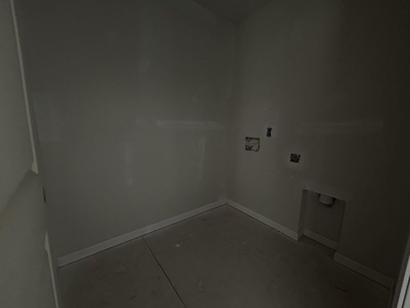 In-progress construction of a new home in Tea Farm: Lake Series, Ravenel, SC (Image 26).