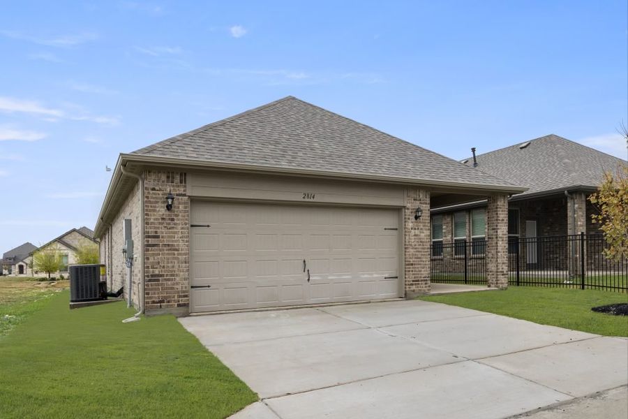 Front exterior of a new home in Redden Farms – Active Adult, Midlothian, TX, highlighting curb appeal (Image 30).