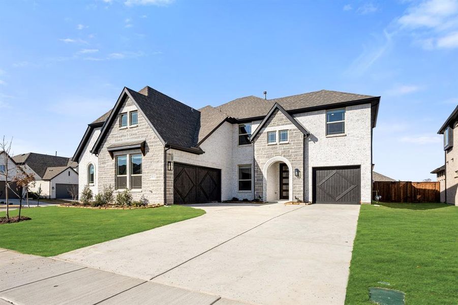 Front exterior of a new home in Devonshire Classic 60-65, Forney, TX, highlighting curb appeal (Image 22). Front exterior of a new home in Devonshire Classic 60-65, Forney, TX, highlighting curb appeal (Image 22).