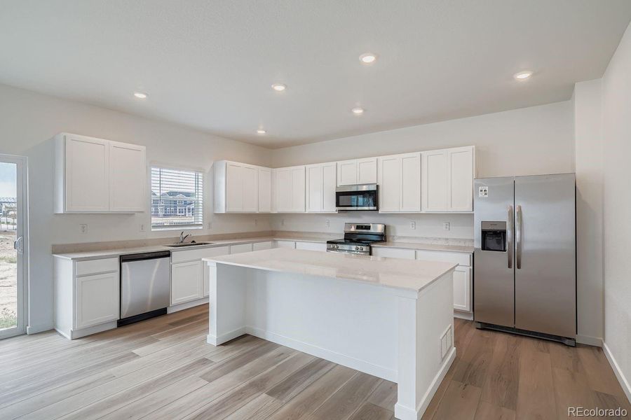Furnished interior view inside a new home in , Thornton (Image 5).