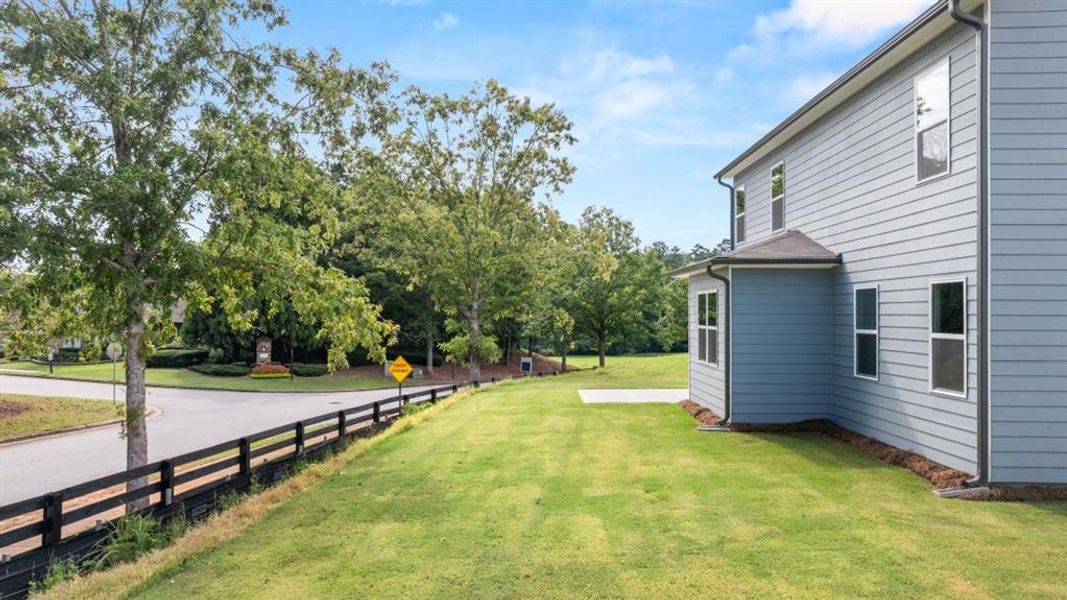 Exterior details and patio area of a home in Fairway 17 at Mirror Lake, Villa Rica (Image 4).