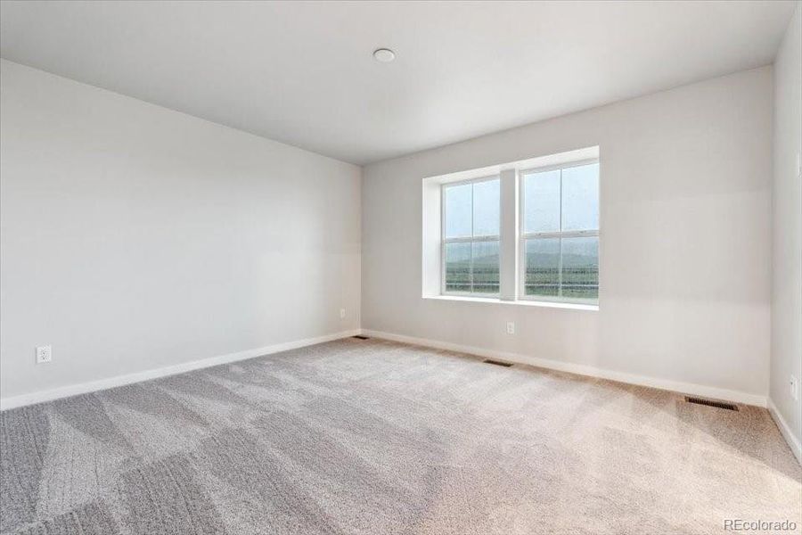 Spacious, unfurnished interior of a new home in Legato, Commerce City (Image 22).