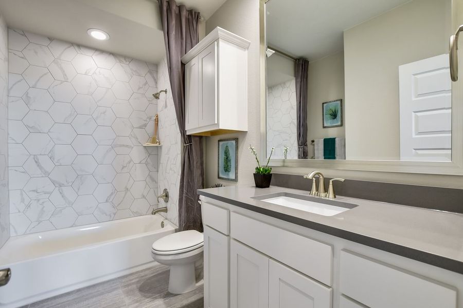 Representative furnished interior of a home built from the Madera II by Giddens Homes in Scofield Farms Estates, Georgetown (Image 141).