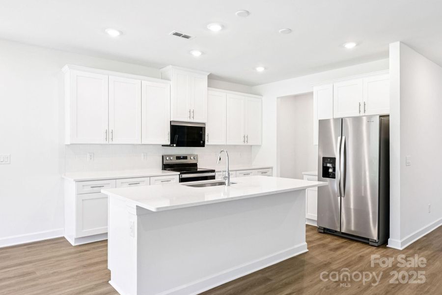 Photo is not of the actual home, but is an inspirational photo of builder’s model home and may depict options, furnishings, and/or decorator features that are not included