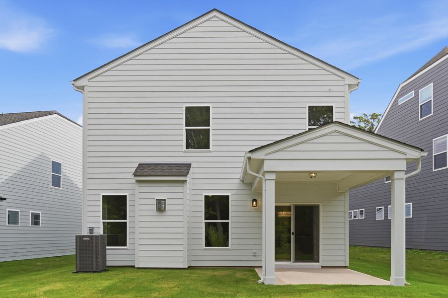 Exterior details and patio area of a home in Caldwell Forest, Charlotte (Image 19).