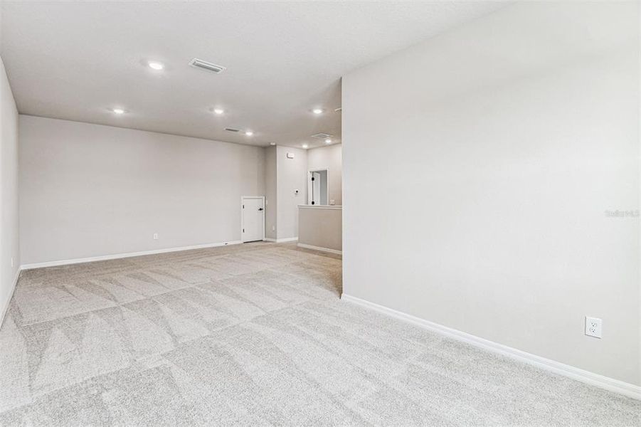 Spacious, unfurnished interior of a new home in Oakfield at Mount Dora Village Series, Mount Dora (Image 30).