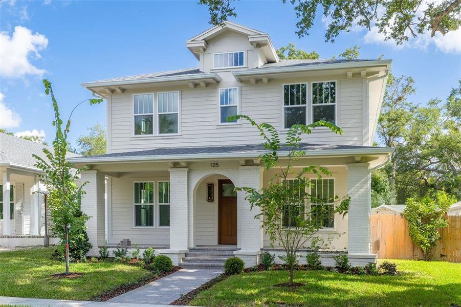 Front exterior of a new home in , St. Petersburg, FL, highlighting curb appeal (Image 23). Front exterior of a new home in , St. Petersburg, FL, highlighting curb appeal (Image 23).