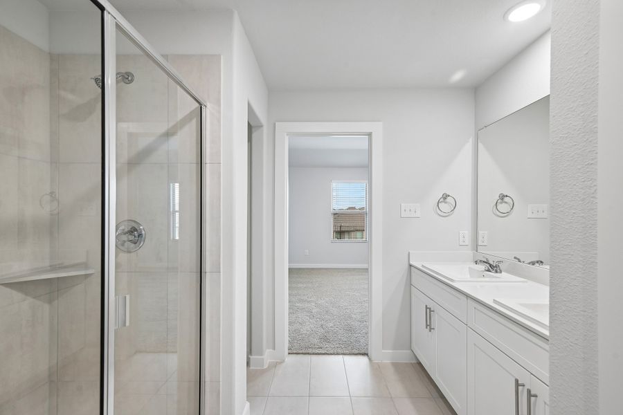 Primary Bathroom in the Hayden home plan by Trophy Signature Homes