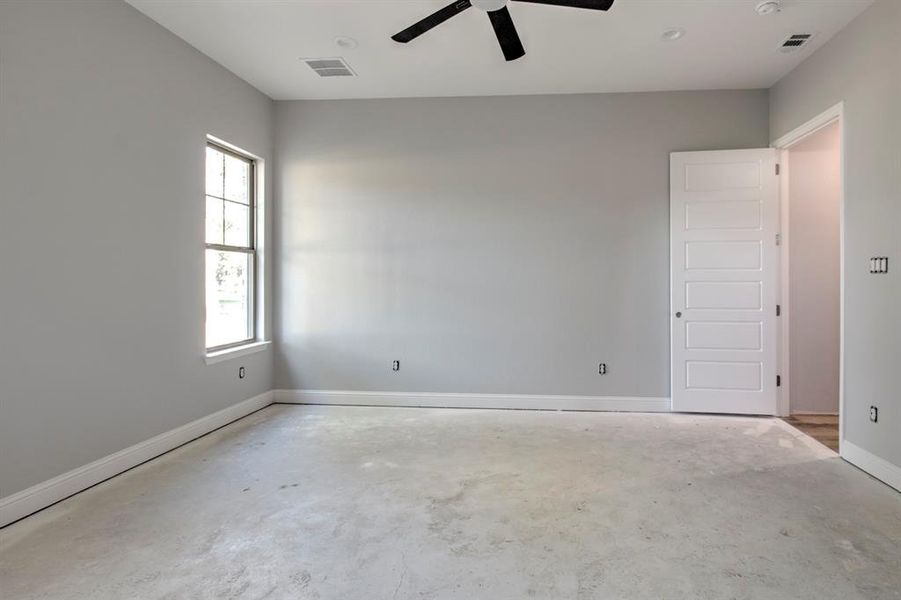 Spare room featuring ceiling fan