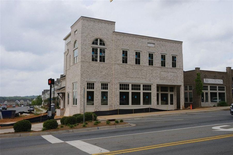 Front exterior of a new home in South on Main, Woodstock, GA, highlighting curb appeal (Image 6).