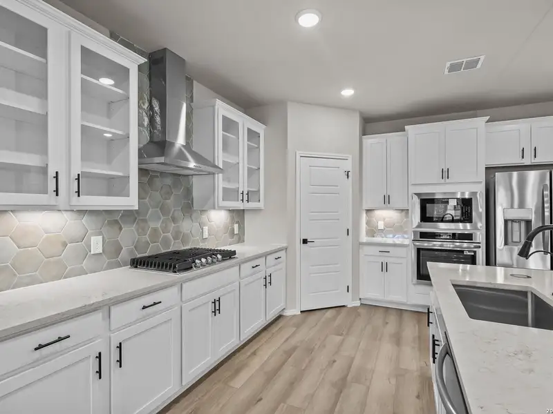 Furnished interior view inside a new home in Bricewood, San Antonio (Image 13).