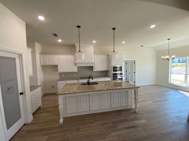 Furnished interior view inside a new home in , Azle (Image 3).