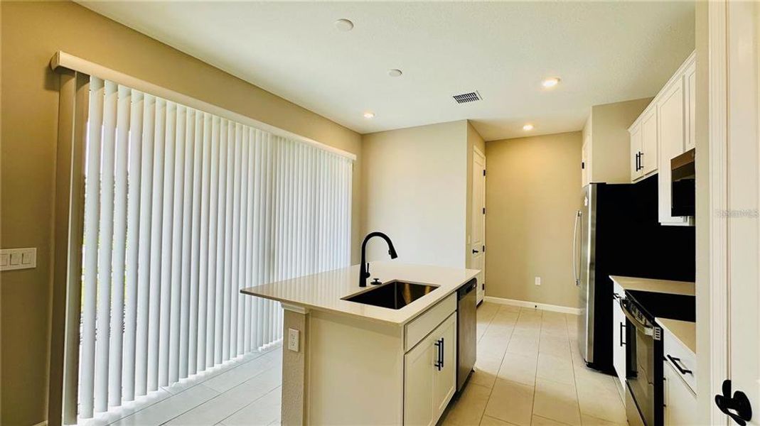 Furnished interior view inside a new home in , Kissimmee (Image 7). Furnished interior view inside a new home in , Kissimmee (Image 7).