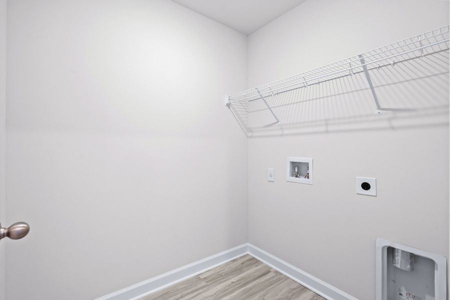 A separate laundry room makes doing chores a breeze. A separate laundry room makes doing chores a breeze.