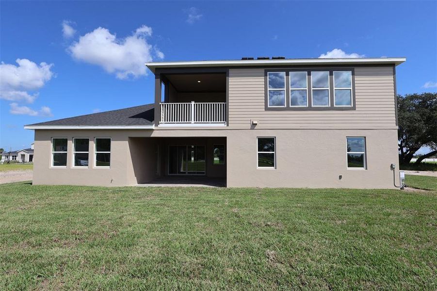 Exterior details and patio area of a home in Solace at Corner Lake, Orlando (Image 18). Exterior details and patio area of a home in Solace at Corner Lake, Orlando (Image 18).