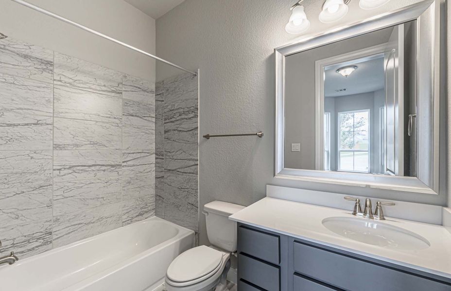 Representative furnished interior of a home built from the 4195 by Ravenna Homes in Artavia 70′, Conroe (Image 15). Representative furnished interior of a home built from the 4195 by Ravenna Homes in Artavia 70′, Conroe (Image 15).