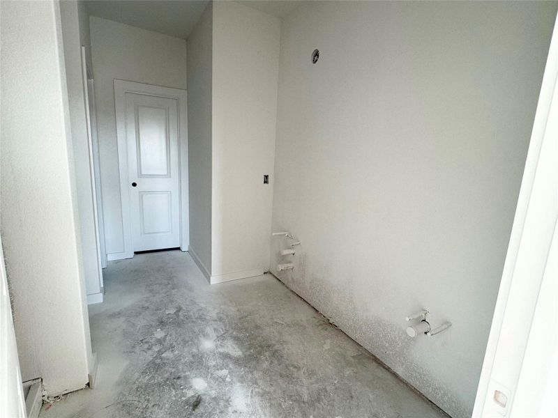 Bathroom with unfinished concrete flooring Bathroom with unfinished concrete flooring