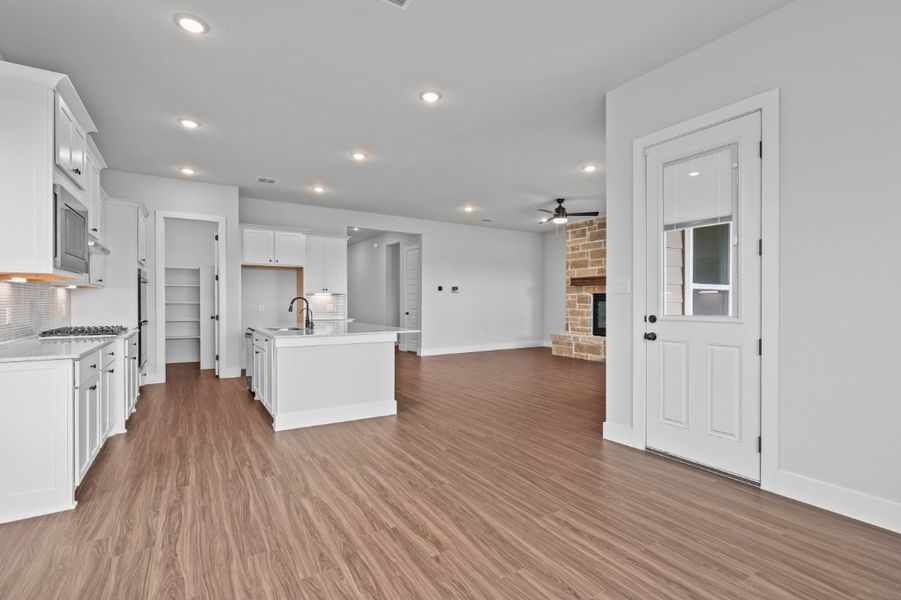 A kitchen with white cabinets. A kitchen with white cabinets.