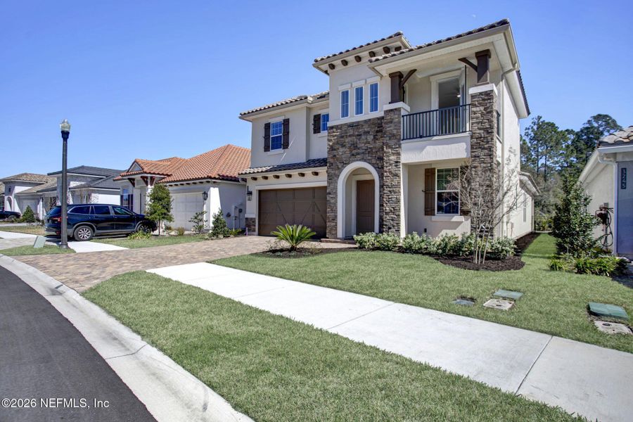 Front exterior of a new home in , Jacksonville, FL, highlighting curb appeal (Image 21).