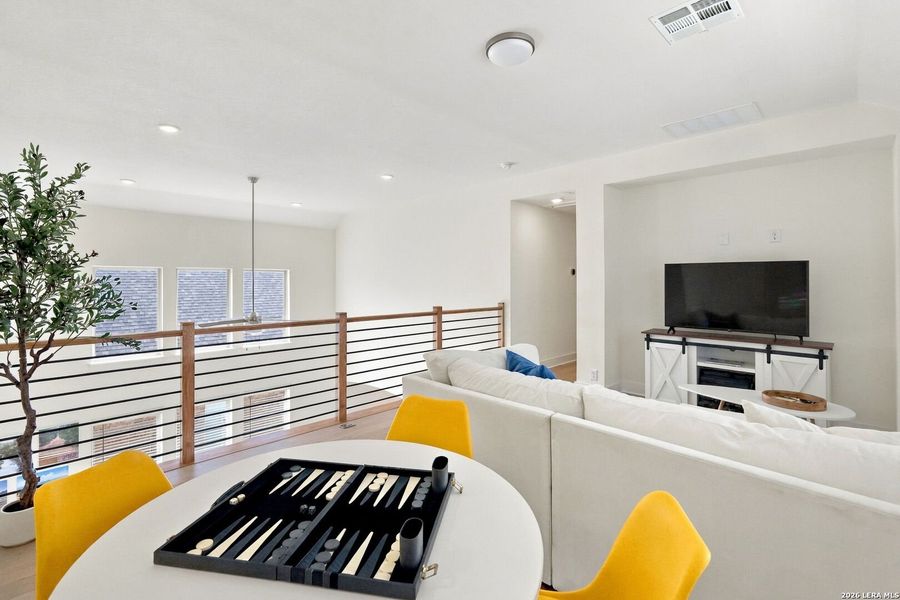 Furnished interior view inside a new home in Gruene Villages, New Braunfels (Image 32).