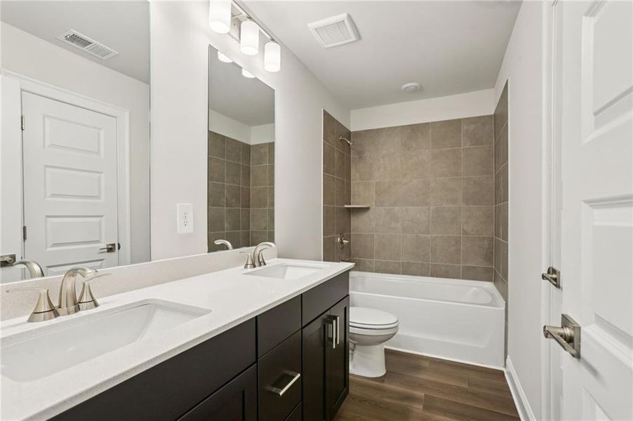 Furnished interior view inside a new home in Hemingway - Highland Series, Cumming (Image 10).