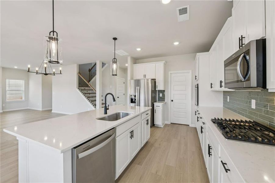 Furnished interior view inside a new home in Vines at Mill Creek - Estate Series, Braselton (Image 9). Furnished interior view inside a new home in Vines at Mill Creek - Estate Series, Braselton (Image 9).