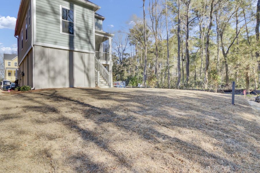 Exterior details and patio area of a home in Indigo Grove Single Family Homes, Johns Island (Image 25).