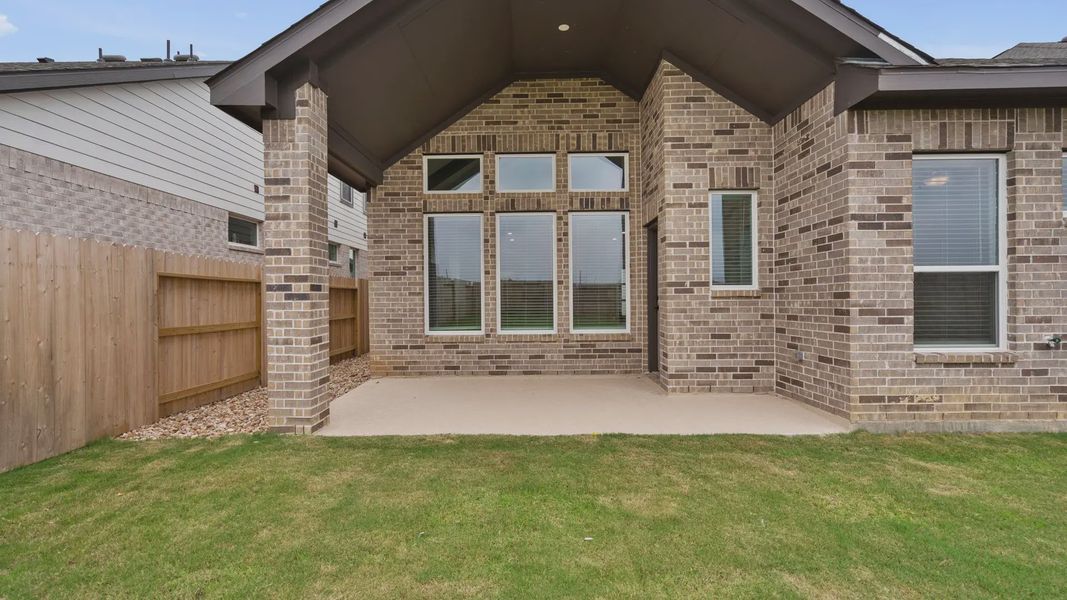 Exterior details and patio area of a home in Wildrye 45', Waller (Image 3).