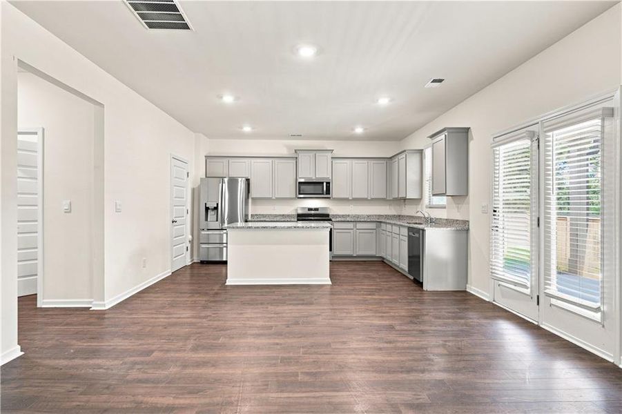 Furnished interior view inside a new home in The Enclave at Flat Rock Hills, Stonecrest (Image 9).