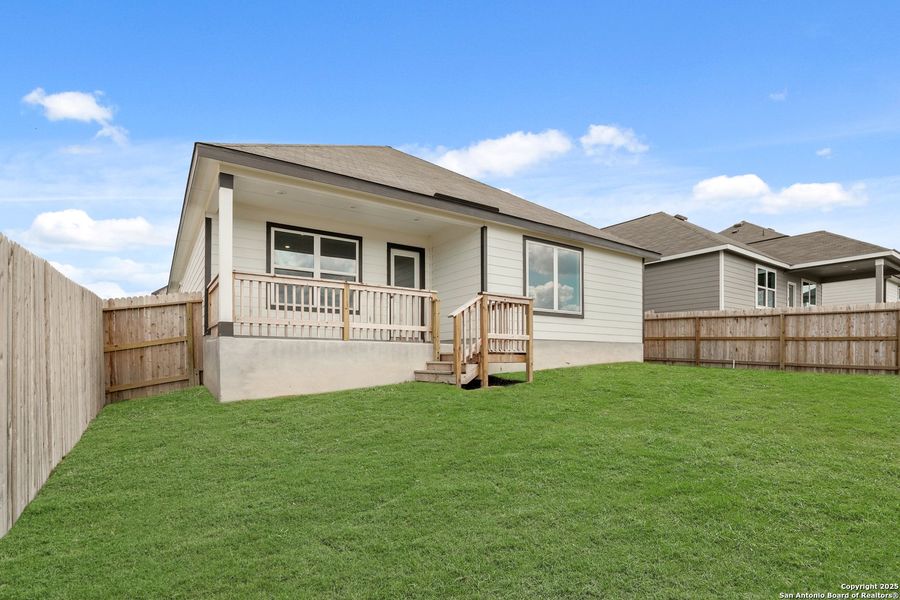 Front exterior of a new home in Hunters Ranch, San Antonio, TX, highlighting curb appeal (Image 21).