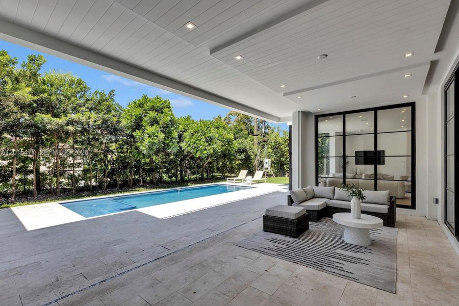 Exterior details and patio area of a home in , Coral Gables (Image 3).