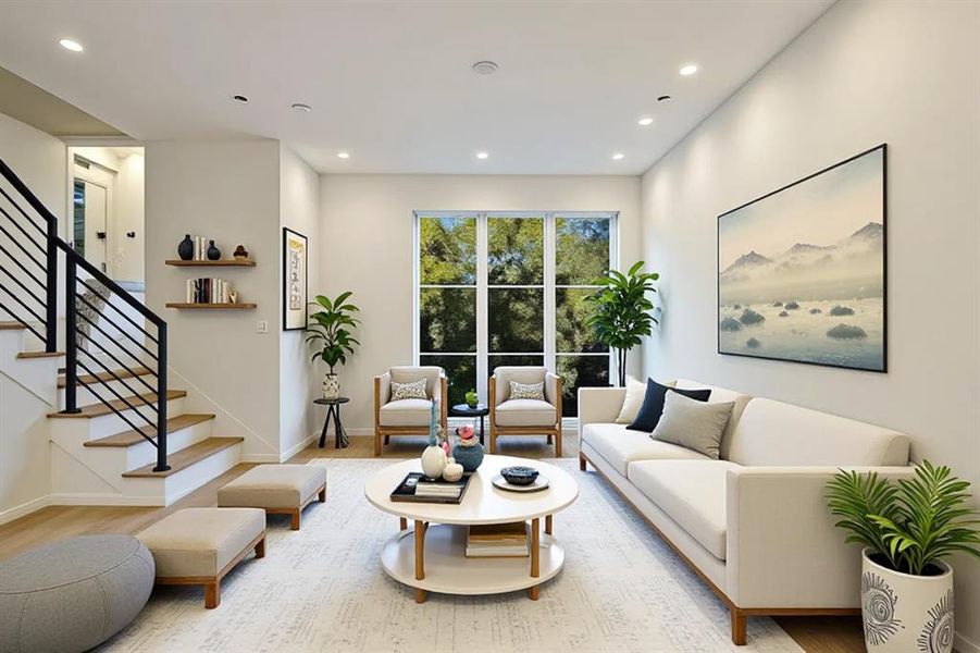 Living area featuring stairway, light wood finished floors, and recessed lighting