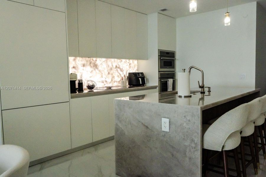 Furnished interior view inside a new home in , Miami (Image 10).