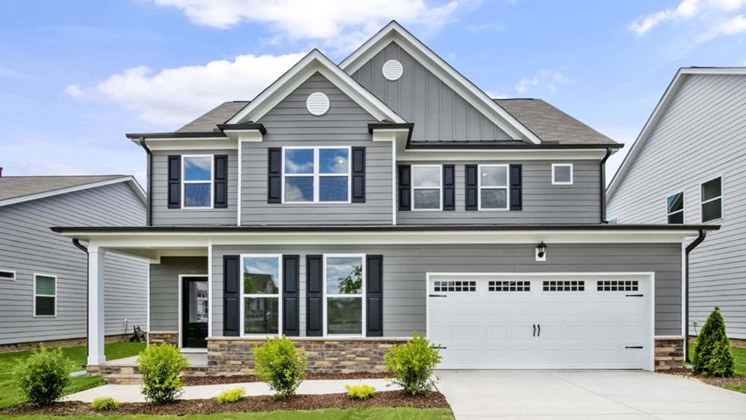 Representative exterior photo of a completed home built from the Lucas by D.R. Horton in The Manors at Haywood Glen, Knightdale, NC (Image 20).