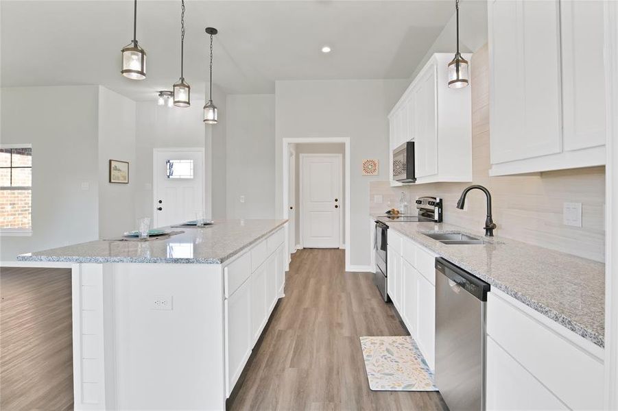 Kitchen in Dove's Nest Collection with Bronze Fixture Package