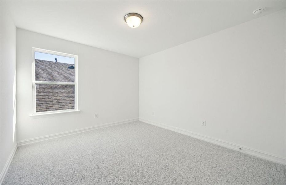 Spacious secondary bedroom *real home pictured