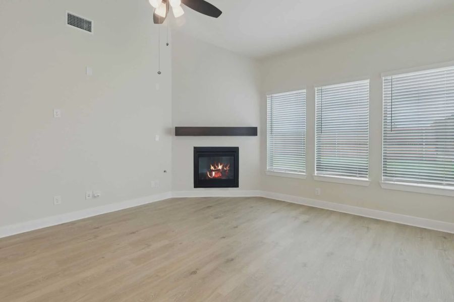 Representative unfurnished interior of a home built from the Wimberly by Chesmar Homes in Heartland 50's and 60's, Heartland (Image 18).