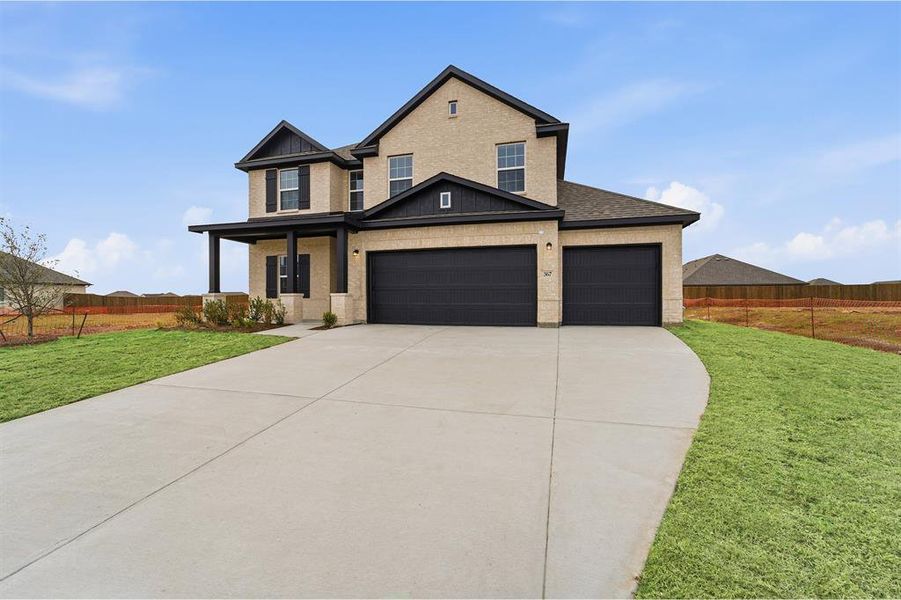 Front exterior of a new home in Saddlebrook Estates, Waxahachie, TX, highlighting curb appeal (Image 2).
