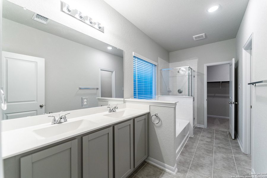 Furnished interior view inside a new home in Hennersby Hollow, San Antonio (Image 2).