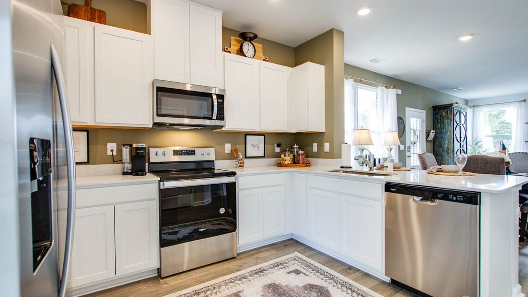 Representative furnished interior of a home built from the OWENS by D.R. Horton in Woodbridge Glen Townhomes, Lebanon (Image 13).